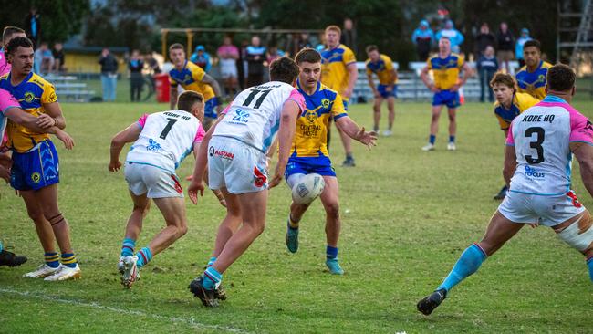 Blair Grant chipping the ball though to the try line. Picture: Thomas Lisson