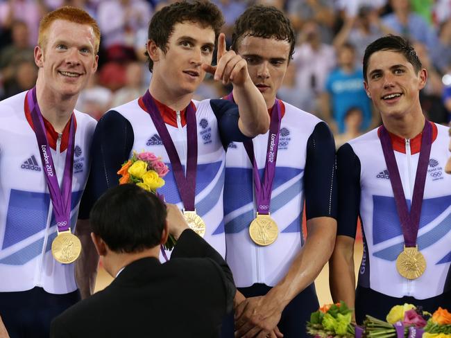 Edward Clancy, Geraint Thomas, Steven Burke and Peter Kennaugh win gold at the men’s team pursuit at the 2012 London Olympics.