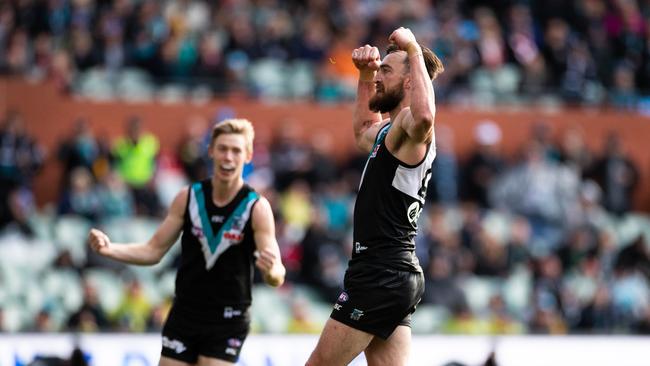 Charlie Dixon of the Power celebrates after kicking a goal during the round 21 match at Adelaide Oval. Picture: Daniel Kalisz/Getty Images