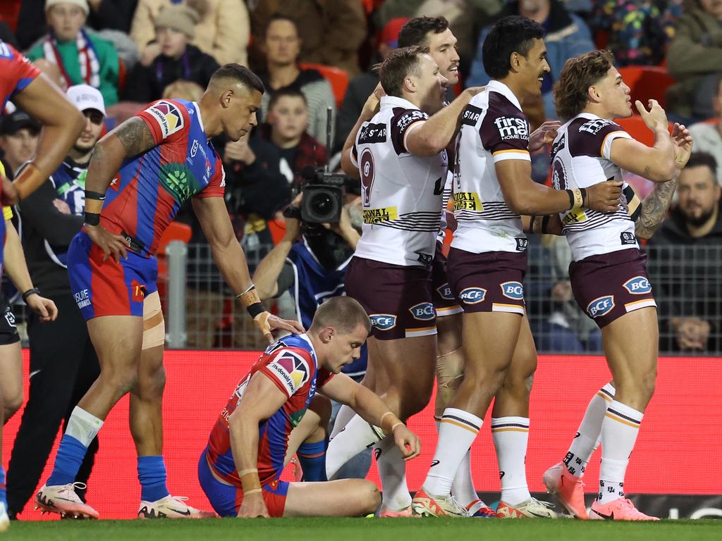 Reece Walsh of the Broncos celebrates scoring a during the round 20 NRL match between Newcastle Knights and Brisbane Broncos at McDonald Jones Stadium, on July 20, 2024, in Newcastle, Australia. (Photo by Scott Gardiner/Getty Images)