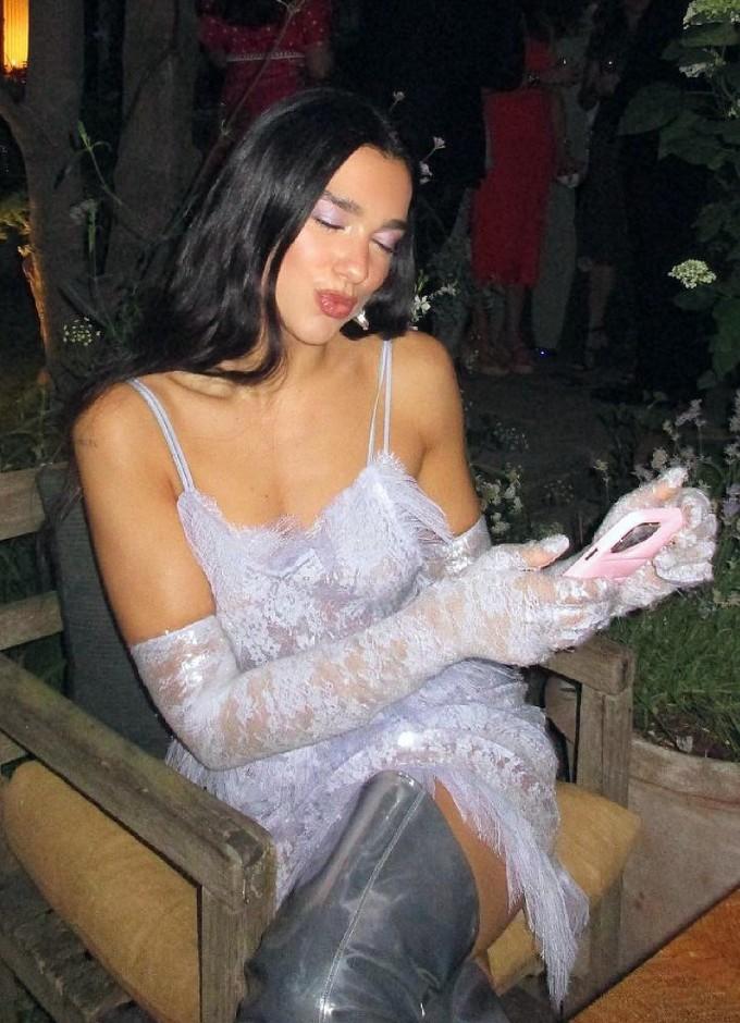 In lace and lilac, Dua Lipa makes the case for the unconventional wedding  guest dress - Vogue Australia