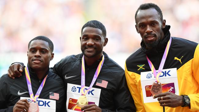 Convicted drug cheat Justin Gatlin (C), Christian Coleman (L) and Usain Bolt (R) at the 2017 IAAF World Championships. Picture: AFP PHOTO/Jewel Samad