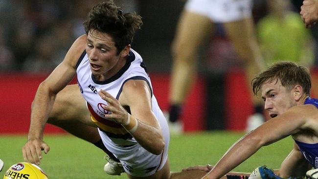 Chayce Jones of the Crows (left) contests with Trent Dumont of the Kangaroos during the Round 4 AFL match against the Kangaroos. Picture: AAP Image/Hamish Blair