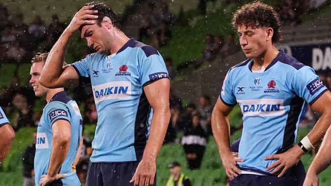 Rob Simmons and Waratahs players look on following a Rebels try during the Round 3 Super Rugby match between the Melbourne Rebels and NSW Waratahs at AAMI Park in Melbourne, Friday, February 14, 2020. (AAP Image/Scott Barbour) NO ARCHIVING, EDITORIAL USE ONLY