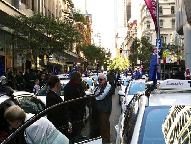 Manly cabs lining up prior to taking part in the Anzac Day march.