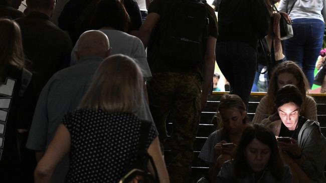 People take shelter in a metro station during a Russian missile strike on Kyiv. Picture: AFP