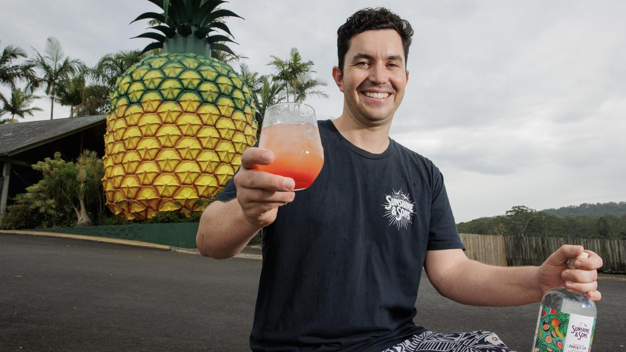 Sunshine &amp; Sons brand manager Jack O’Neill at the Big Pineapple on the Sunshine Coast. Picture: Lachie Millard