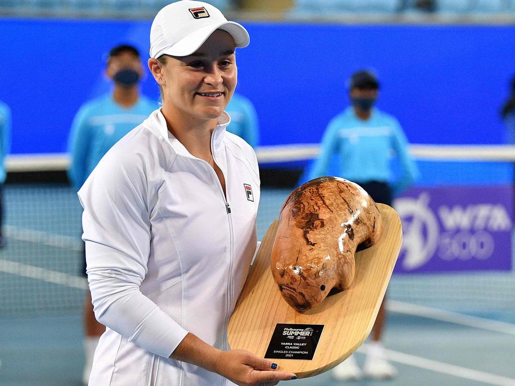 Australia's Ashleigh Barty poses with her trophy after winning the Yarra Valley Classic women's singles final.