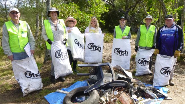 OzFish volunteers with beer bottles and cans, plastics and plastic bait bags, pieces of foam, shoes, containers, clothes and other household rubbish found at North Creek Ballina.