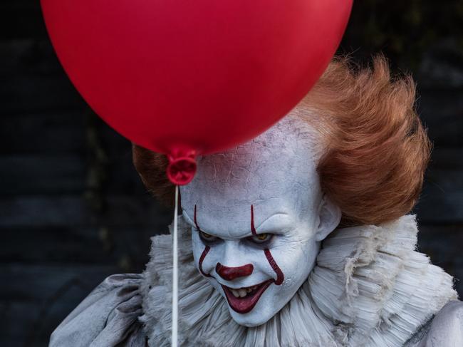 Pennywise the Clown (Bill Skarsgard) in a scene from Stephen King's It. Roadshow Films.