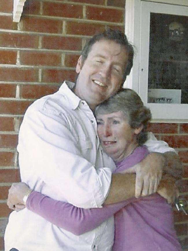 Jim Moginie meeting his birth mother, Anne, in 2003: “I’d never thought I would ever get to hug my birth mother,” he writes. “It was no normal hug.” Picture: Suzy Flowers