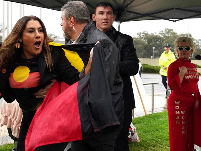 Independent Senator Lidia Thorpe is manhandled after attempting to disrupt British anti-transgender rights activist Kellie-Jay Keen-Minshull, also known as Posie Parker at a Ã¢â¬ÅLet Womaen SpeakÃ¢â¬Â anti trans rally outside Parliament House in Canberra, Thursday, March 23, 2023. (AAP Image/Michelle Haywood) NO ARCHIVING