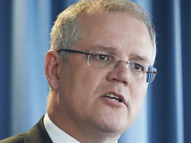 Treasurer Scott Morrison during a media conference to announce the Federal mid-year budget review. Tuesday, Dec. 15, 2015. (AAP Image/Aaron Bunch) NO ARCHIIVNG