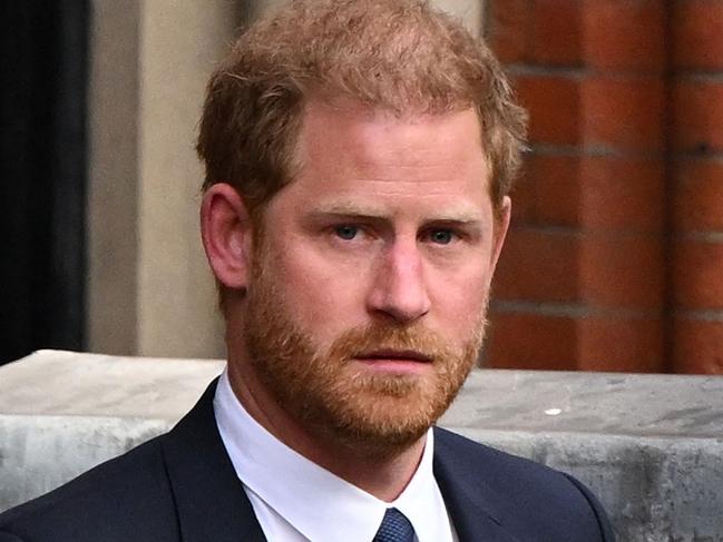 (FILES) Britain's Prince Harry, Duke of Sussex leaves from the Royal Courts of Justice, Britain's High Court, in central London on March 27, 2023. Lawyers for Prince Harry on December 5 began a legal challenge over his security arrangements in the UK, after he quit frontline royal duties and moved to North America.  The case about his loss of UK taxpayer-funded protection is the latest in a string of court proceedings initiated by Harry, whose father is King Charles III. (Photo by JUSTIN TALLIS / AFP)