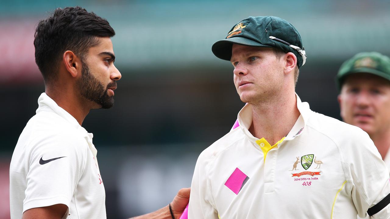 India's Virat Kohli and Australian star Steve Smith meet on the pitch.