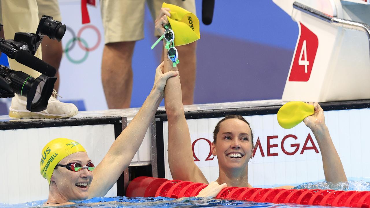 Simply the best: Emma McKeon (right) wins gold in the women's 100m freestyle final at the Tokyo 2020 Olympics. Picture: Adam Head