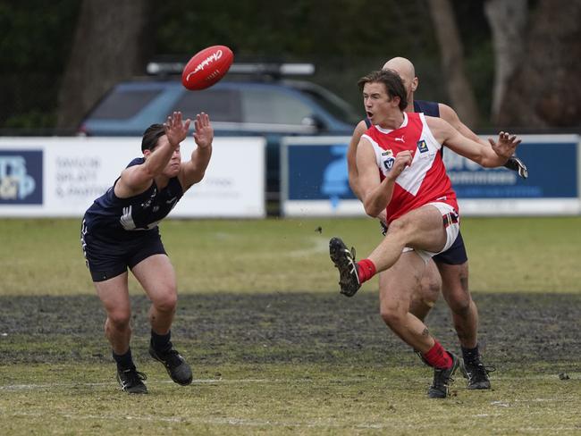 Harry Sullivan takes a kick for Red Hill.