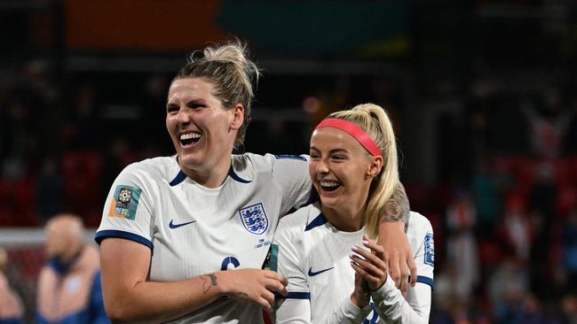 Bright (L) and Chloe Kelly celebrate. (Photo by Brenton EDWARDS / AFP)