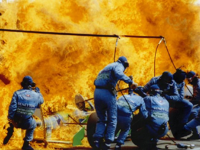 The Benetton Ford of Netherlands' Jos Verstappen burns as the crew tries to escape during a refuelling procedure in 1994. Picture: Reuters, Joachim Herrmann