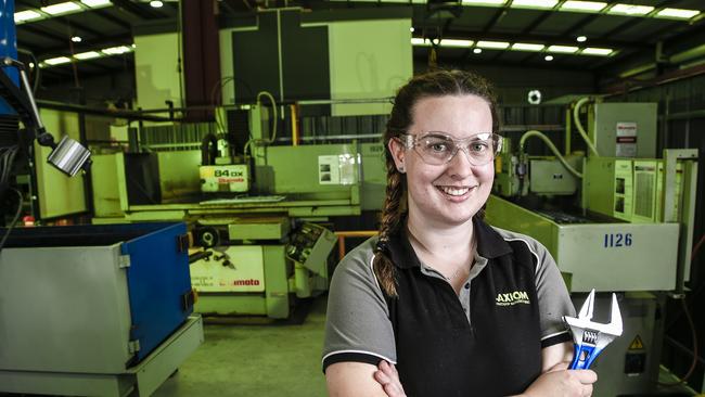 Apprentice mechanical fitter and turner Georgia Robertson, 21, at Axiom Precision Manufacturing in Adelaide. Picture: Roy VanDerVegt