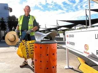 CLEANING UP: Andy Brodersen said he was told by Redbank Plaza management he could no longer use the shopping centre's rubbish bins or clean up on their property. Picture: Rob Williams