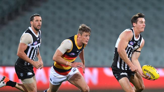 Port Adelaide takes on Adelaide in the SA showdown earlier this season.