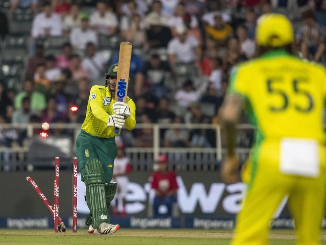 South Africa's captain Quinton de Kock is bowled by Mitchell Starc in the first over. Picture: AP Photo/Themba Hadebe