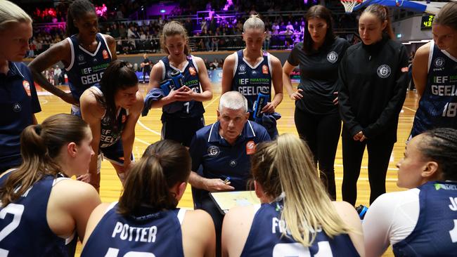 GEELONG, AUSTRALIA - OCTOBER 30: Chris Lucas, Head Coach of Geelong United speaks to players during the round one WNBL match between Geelong United and Townsville Fire at The Geelong Arena, on October 30, 2024, in Geelong, Australia. (Photo by Kelly Defina/Getty Images)