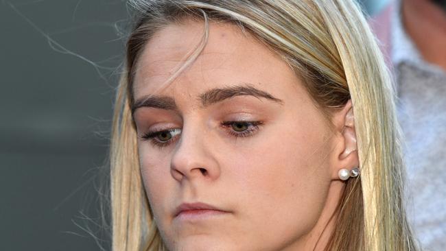 Australian swimmer Shayna Jack is seen talking to the media after her briefing with ASADA (Australian Sports Anti-doping Authority) officials in Brisbane, Friday, August 2, 2019. Ms Jack faces a possible four-year ban after testing positive to Ligandrol, a muscle growth agent. (AAP Image/Darren England) NO ARCHIVING