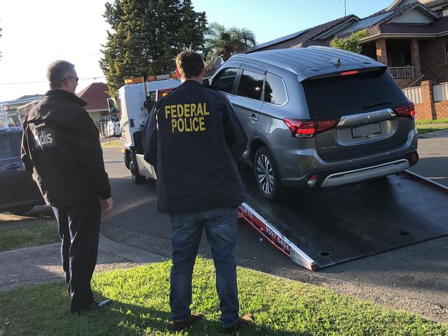 Sydney woman Rehana Memon has been jailed for her part in a “sophisticated” fraud against the NDIS. Pictured: Police and NDIA staff present he was arrested in 2020, where some of assets were restrained following a multi-agency investigation. Supplied image