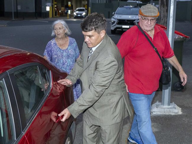 Scott Rush with parents Lee and Christine Rush outside Brisbane watch-house on Monday. Picture: Richard Walker