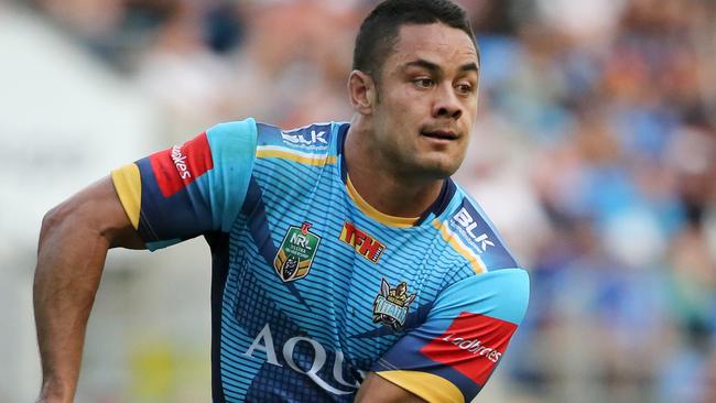 Jarryd Hayne shapes to pass in his Titans debut.