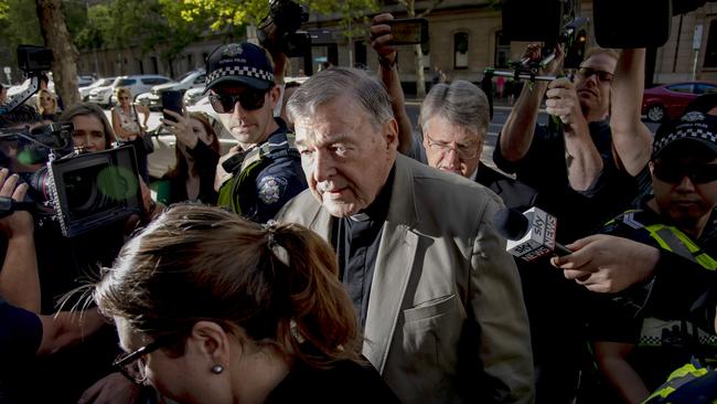 Cardinal George Pell arrives at the County Court in Melbourne on Wednesday. Picture: Andy Brownbill