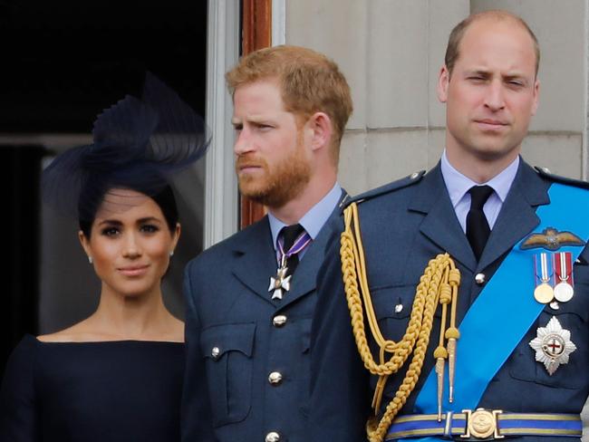 (FILES) In this file photo taken on July 10, 2018 (L-R) Britain's Meghan, Duchess of Sussex, Britain's Prince Harry, Duke of Sussex, Britain's Prince William, Duke of Cambridge and Britain's Catherine, Duchess of Cambridge, stand on the balcony of Buckingham Palace on July 10, 2018 to watch a military fly-past to mark the centenary of the Royal Air Force (RAF). - Princes William and Harry on January 13, 2020 put on a rare joint front to dismiss a "false story" speculating about their relationship, as senior royals met for talks about the younger brother's future. "For brothers who care so deeply about the issues surrounding mental health, the use of inflammatory language in this way is offensive and potentially harmful," they said. (Photo by Tolga AKMEN / AFP)