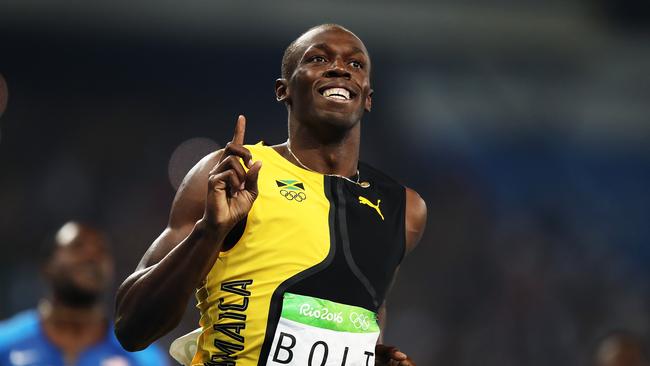 Usain Bolt celebrates after winning the 100m at the Rio Olympics. Picture: Brett Costello