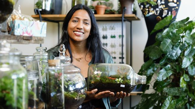 Green Room co owner Rebecca Manik with the store's terrariums for sale. Picture: Brendan Radke