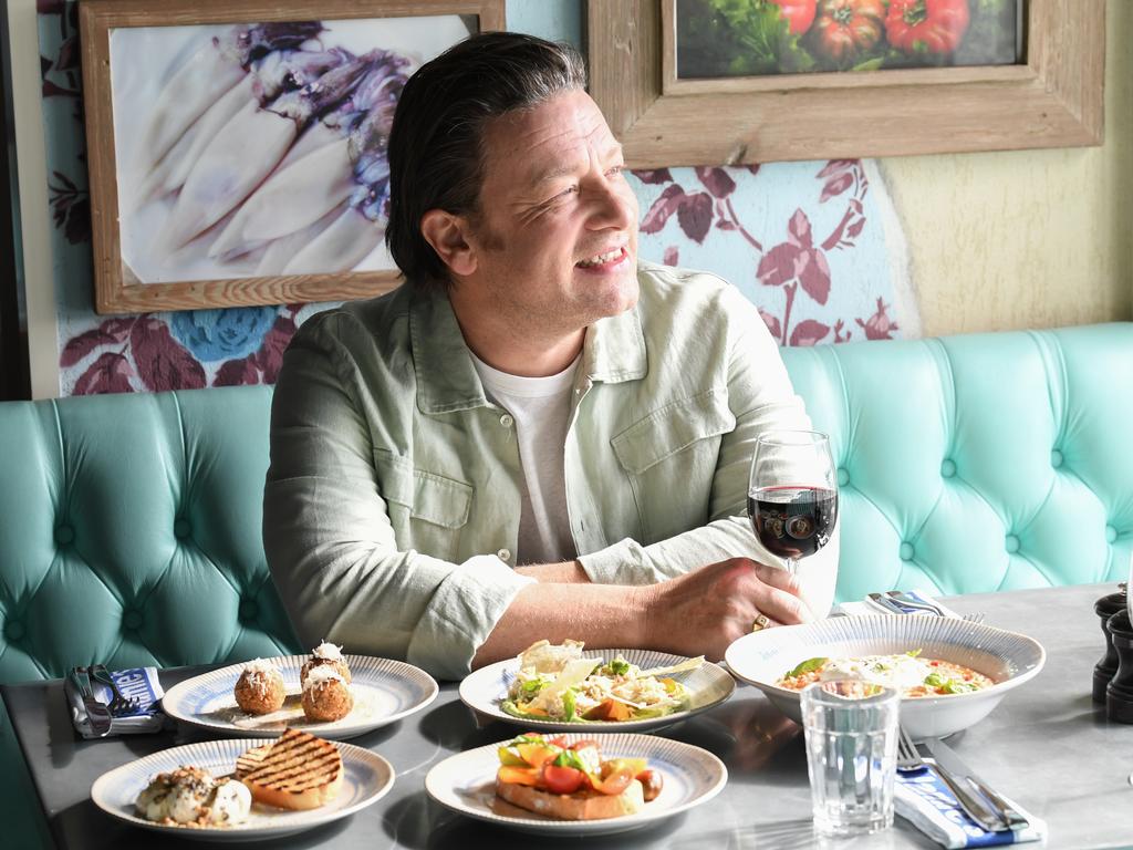 Jamie’s Italian has been satisfying passengers on-board Royal’s eight ships since 2014. Here he’s enjoying some of his dishes on-board Ovation of the Seas. Picture: James D. Morgan/Getty Images