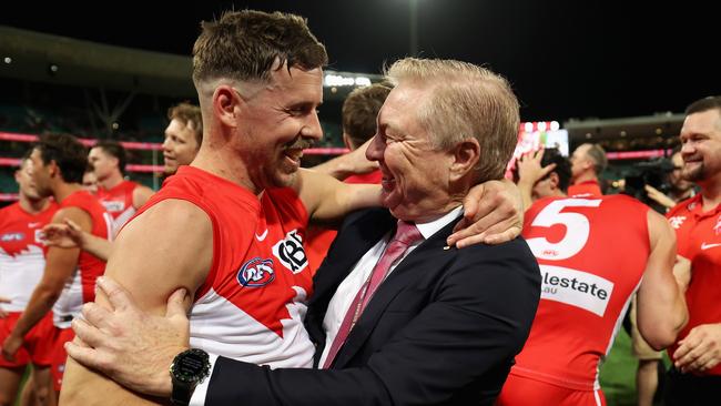 SYDNEY, AUSTRALIA - SEPTEMBER 07: Jake Lloyd of the Swans celebrates with Sydney Swans chairman Andrew Pridham after winning  the AFL First Qualifying Final match between Sydney Swans and Greater Western Sydney Giants at Sydney Cricket Ground, on September 07, 2024, in Sydney, Australia. (Photo by Cameron Spencer/Getty Images)