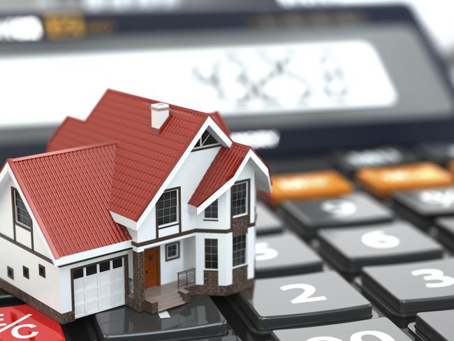 Real estate concept. House on calculator. Mortgage. Picture: THINKSTOCK