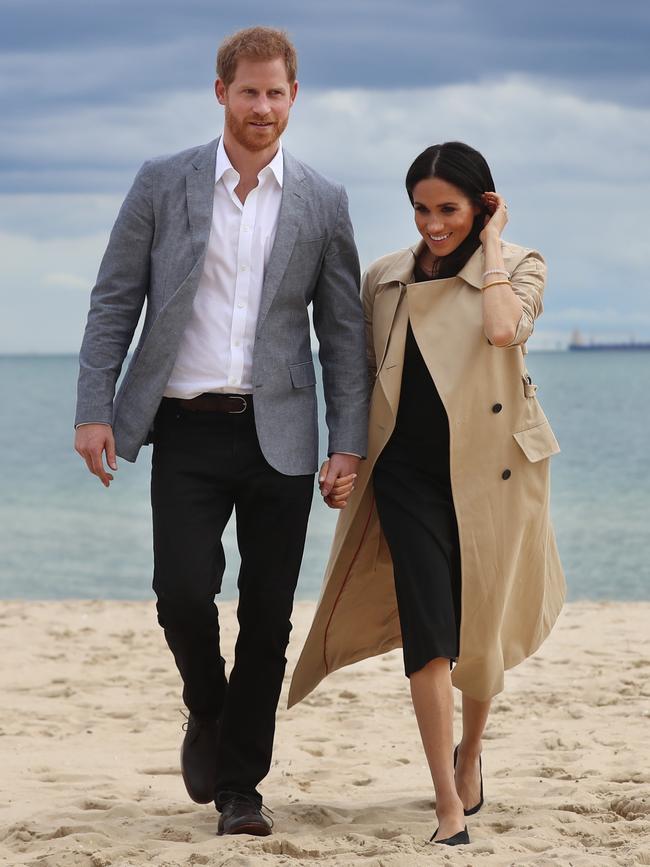 Harry and Meghan walk along South Melbourne Beach. Picture: Alex Coppel