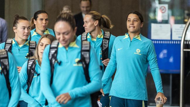 Matildas players leaving the Hilton Hotel in Brisbane.