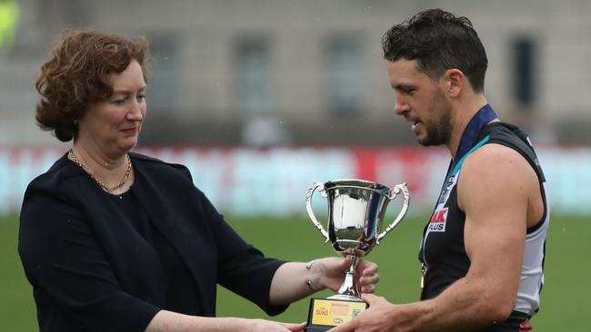 Travis Boak of the Power receives the Shanghai Cup after the 40-point win against Gold Coast. Picture: Sean Garnsworthy/AFL Media/Getty Images                        <a capiid="b3677c4e0840798cf25feb835f014d1d" class="capi-video">Deflated Sherrin delays Shanghai clash</a>