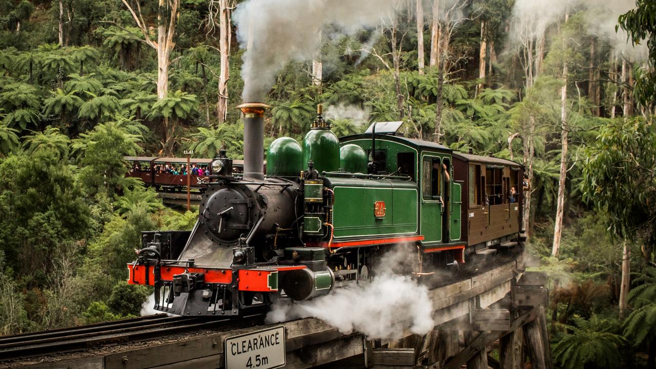 Puffing Billy travels over the trestle bridge.