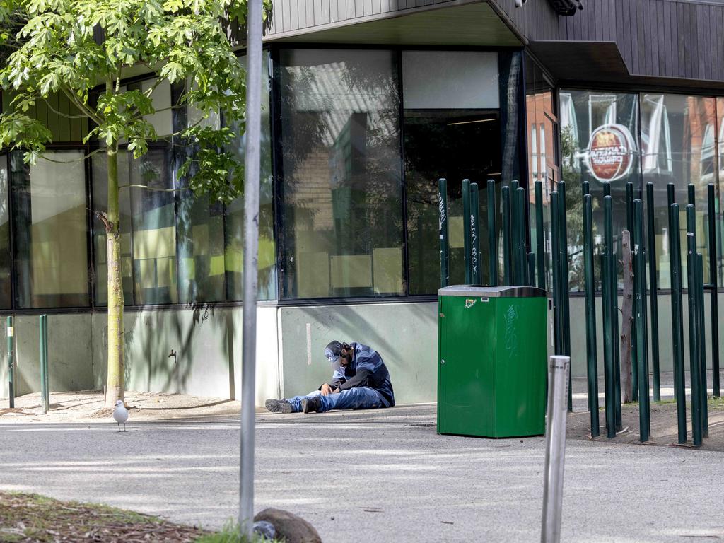 A man nods off and passes out after injecting heroin at the safe injecting room. Picture: David Geraghty