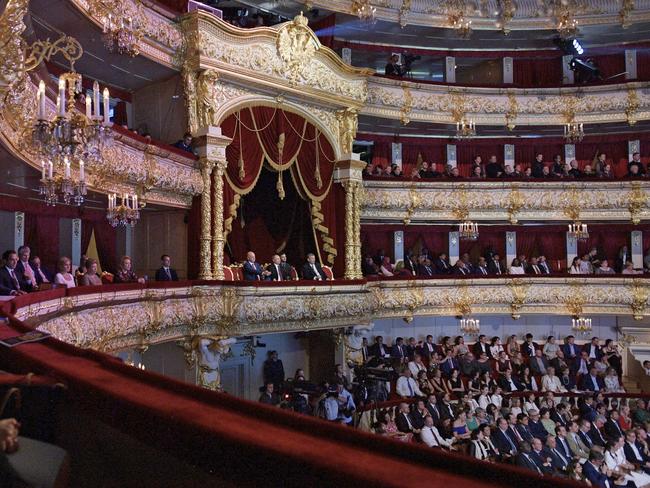 Russian President Vladimir Putin, center in the theater box, FIFA President Gianni Infantino, left in the theater box, and Director of the Bolshoi Theater Vladimir Urin, right in the theater box, attend the gala-concert dedicated to the closing of FIFA Soccer World Cup at the Bolshoi Theater in Moscow, Russia, Saturday, July 14, 2018. (Alexei Druzhinin/Sputnik Kremlin via AP, Pool)
