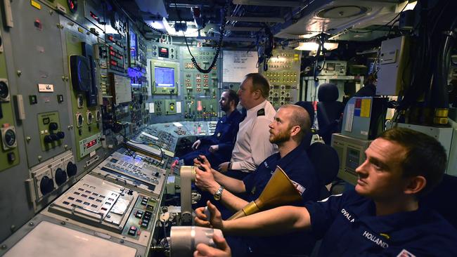 Royal Navy personnel in the control room on HMS Vigilant. Picture: Getty Images