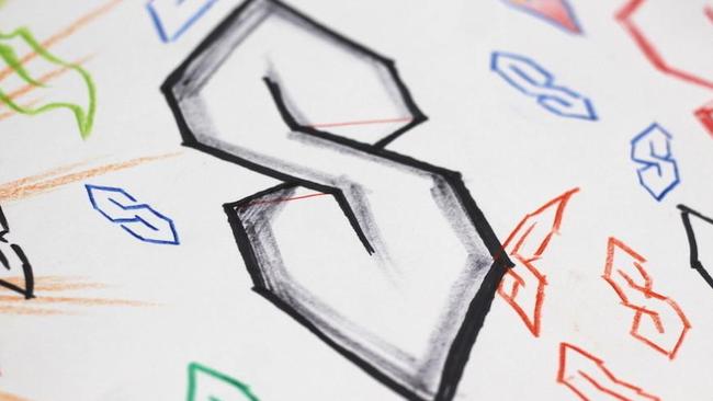 The story behind the pointy S symbol you drew in high school