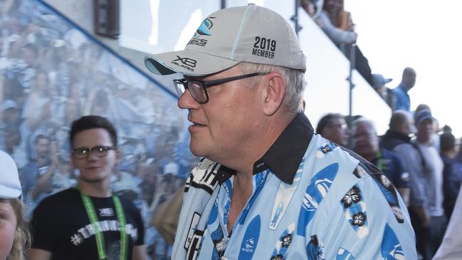 Morrison has become a very public Sharks fan since joining federal politics as the local member. (AAP Image/Craig Golding)