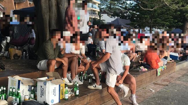 Revellers on East Esplanade, Manly, late on Saturday afternoon. There is no suggestion that anyone in this photograph is drinking illegally. Picture: Supplied