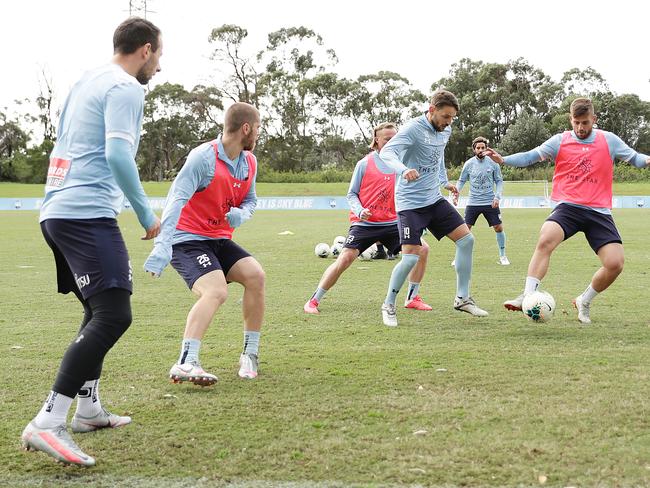 SYDNEY, AUSTRALIA - JULY 16: Milos Ninkovic and Chris Zuvela compete during a Sydney FC A-League training session at Macquarie University Sports Fields on July 16, 2020 in Sydney, Australia. (Photo by Mark Metcalfe/Getty Images)